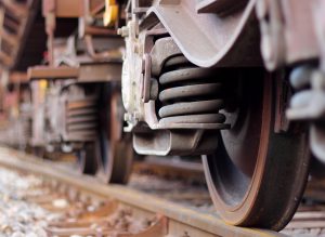 Acme OEM Transportation parts | Close-up of train wheels on a track